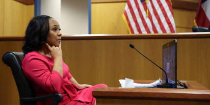 Trump DA Fani Willis takes the stand as judge considers whether to disqualify her