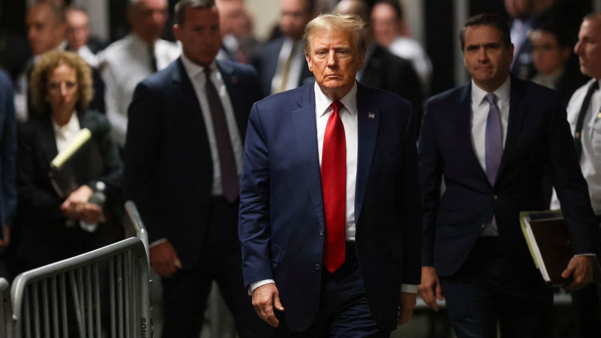 Former U.S. President Donald Trump walks outside the courtroom on the day of a court hearing on charges of falsifying business records to cover up a hush money payment to a porn star before the 2016 election, in New York State Supreme Court in the Manhattan borough of New York City, U.S., February 15, 2024.