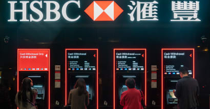 HSBC posts record annual profit but misses estimates on China write-down, shares tumble 7%