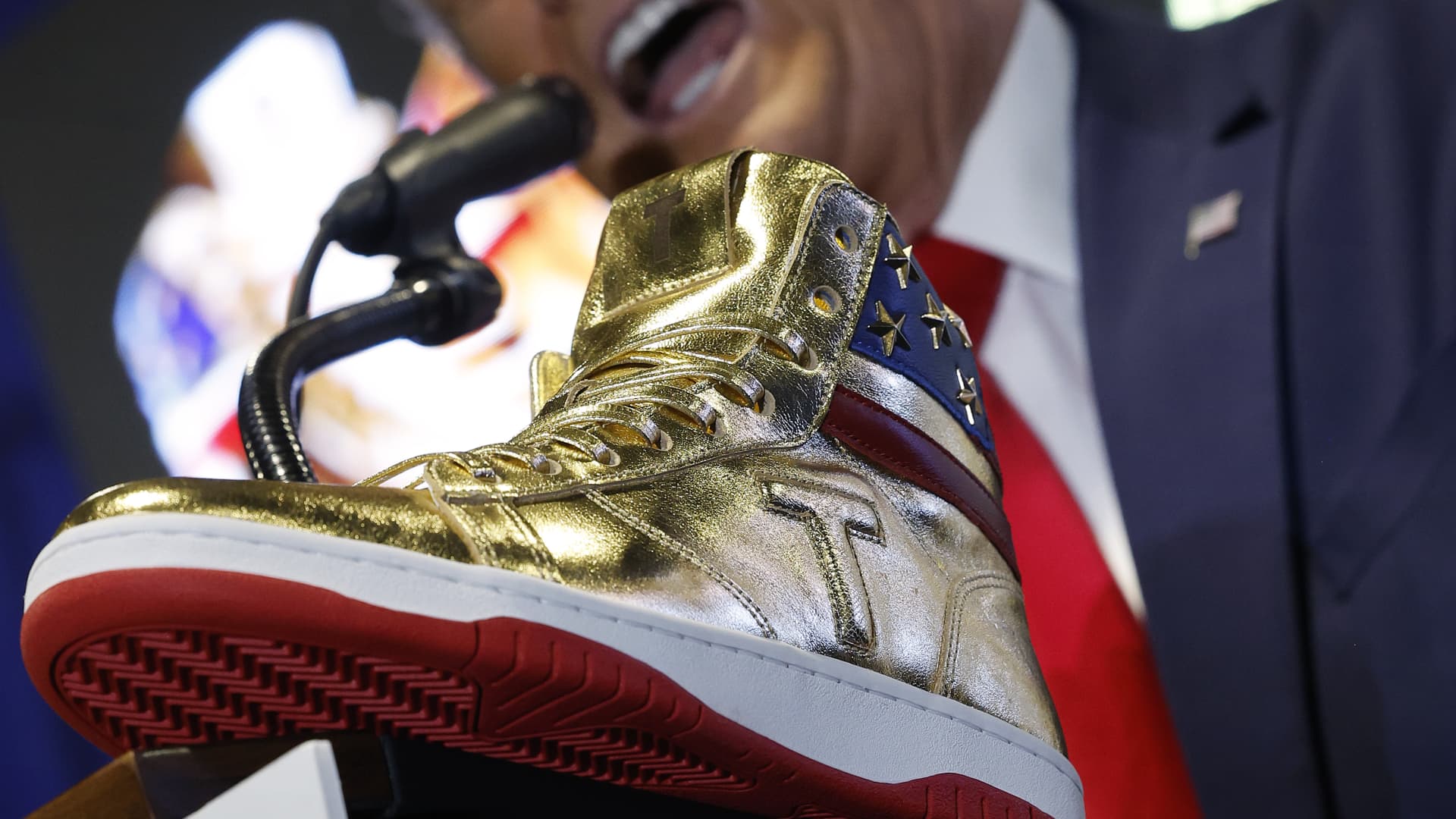 Republican presidential candidate and former President Donald Trump delivers remarks while introducing a new line of signature shoes at Sneaker Con at the Philadelphia Convention Center on February 17, 2024 in Philadelphia, Pennsylvania. 