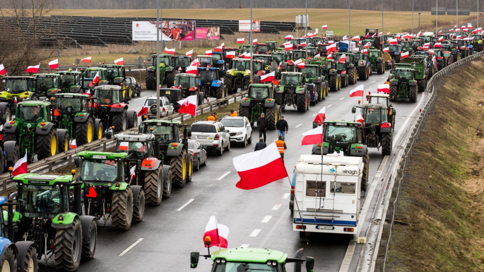 Polish farmers with their tractors and vehicles block the expressway S3 during a demonstration. Polish farmers are staging protests against cheap Ukrainian grain flooding the market and EU regulations on pesticide and fertiliser usage. Tractors with Polish flags blocked motorways and major junctions in almost 200 locations in Poland. 