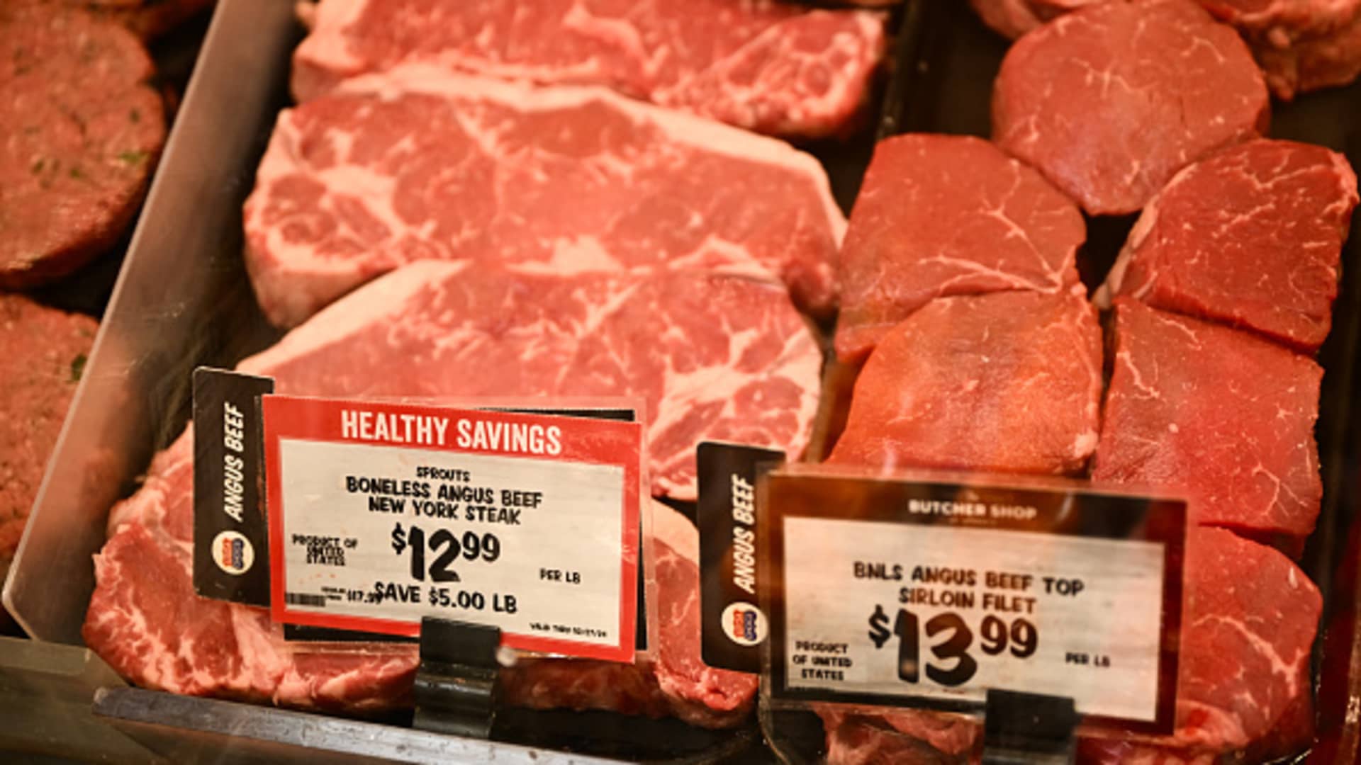 Packages of angus beef steaks and top sirloin fillets are displayed for sale in the meat area of a Sprouts Farmers Market grocery store in Redondo Beach, California on February 23, 2024. 