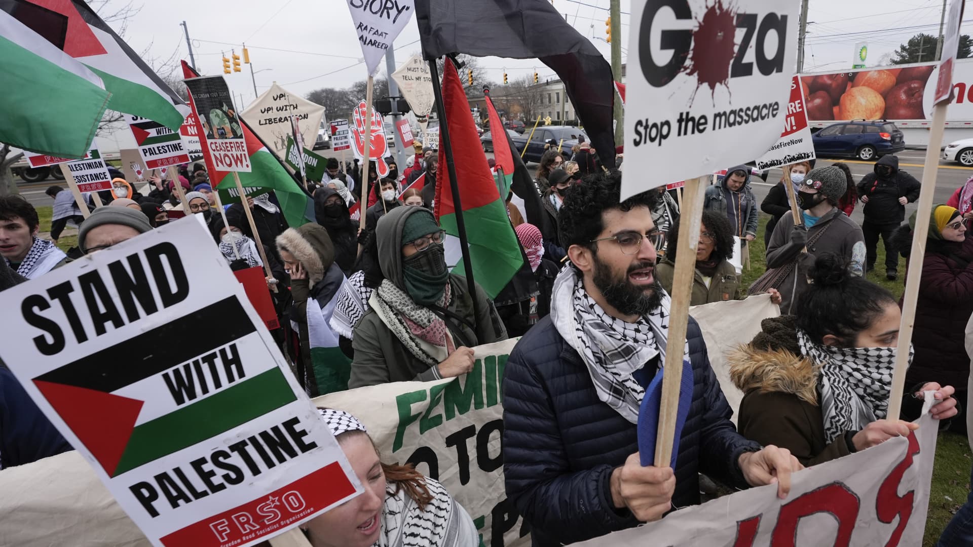 Pro-Palestinian demonstrators march during a visit by President Joe Biden in Warren, Mich., Feb. 1, 2024.