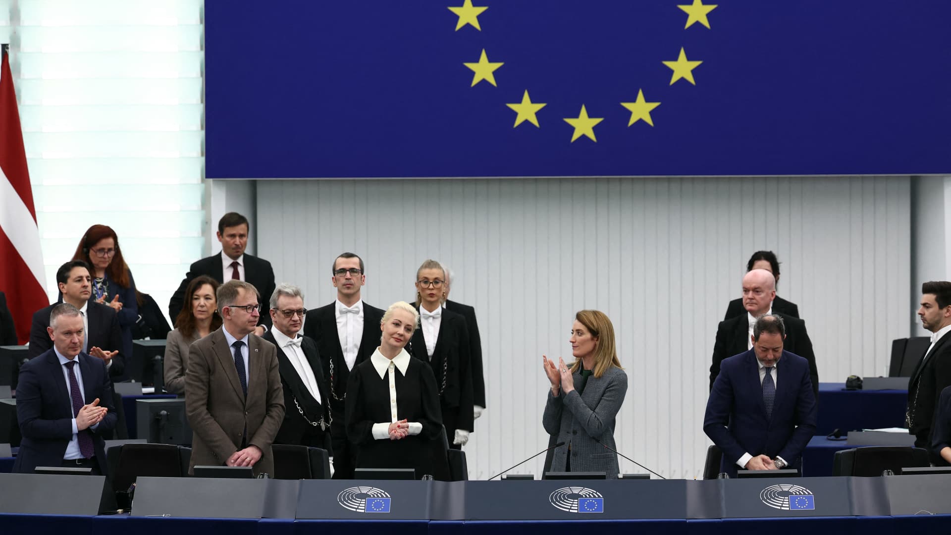 Yulia Navalnaya (first row, 3rdL), widow of Kremlin opposition leader Alexei Navalny, who died on February 16 in a Russian prison, is applauded by European Parliament President Roberta Metsola (first row, 3rdR) after addressing the European Parliament in Strasbourg, eastern France, on February 28, 2024. 