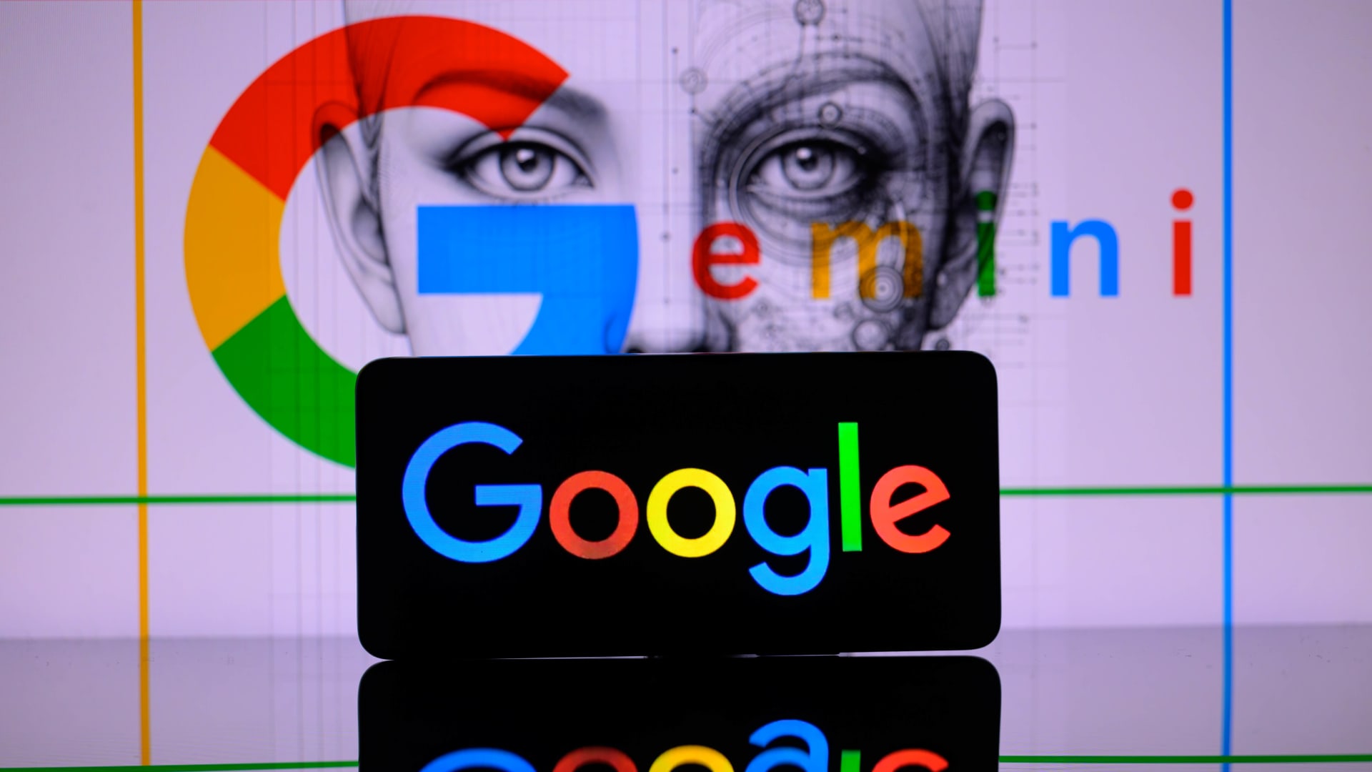 A smart phone displaying Google with Google Gemini in the background is being featured in this photo illustration in Brussels, Belgium, on February 8, 2024. 