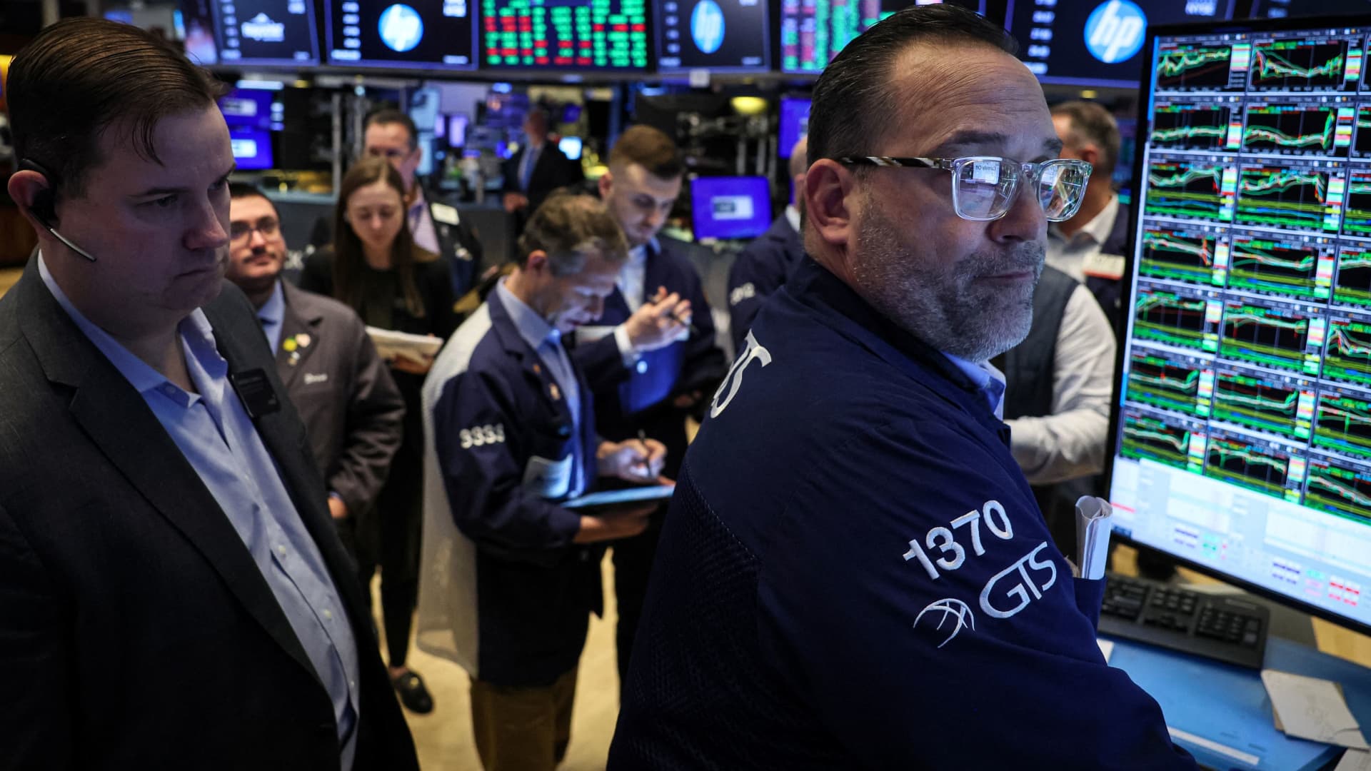 Traders work on the floor at the New York Stock Exchange on Feb. 29, 2024.