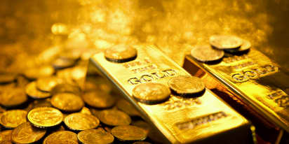 Gold prices turn slightly higher after Federal Reserve holds interest rates steady