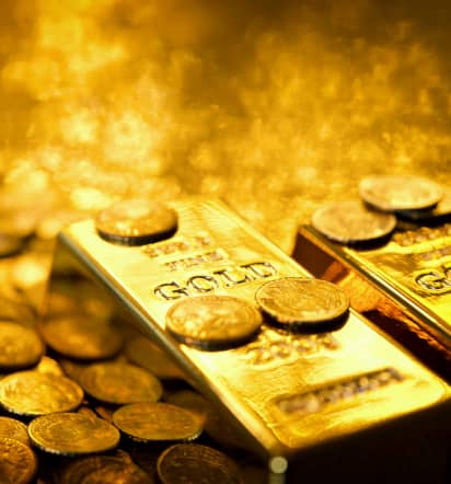 Gold prices flutter higher as Fed holds rates steady