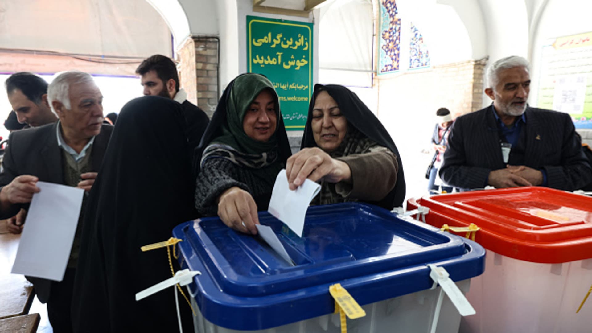 Iranian women cast their ballots at a polling station during elections to select members of parliament and a key clerical body, in Tehran on March 1, 2024.