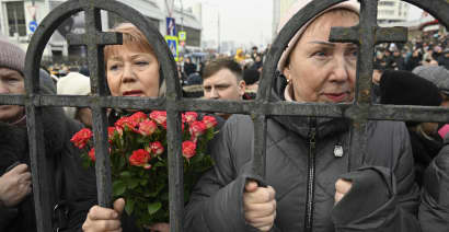 Navalny's funeral in pictures: Mourners gather as riot police contain crowds