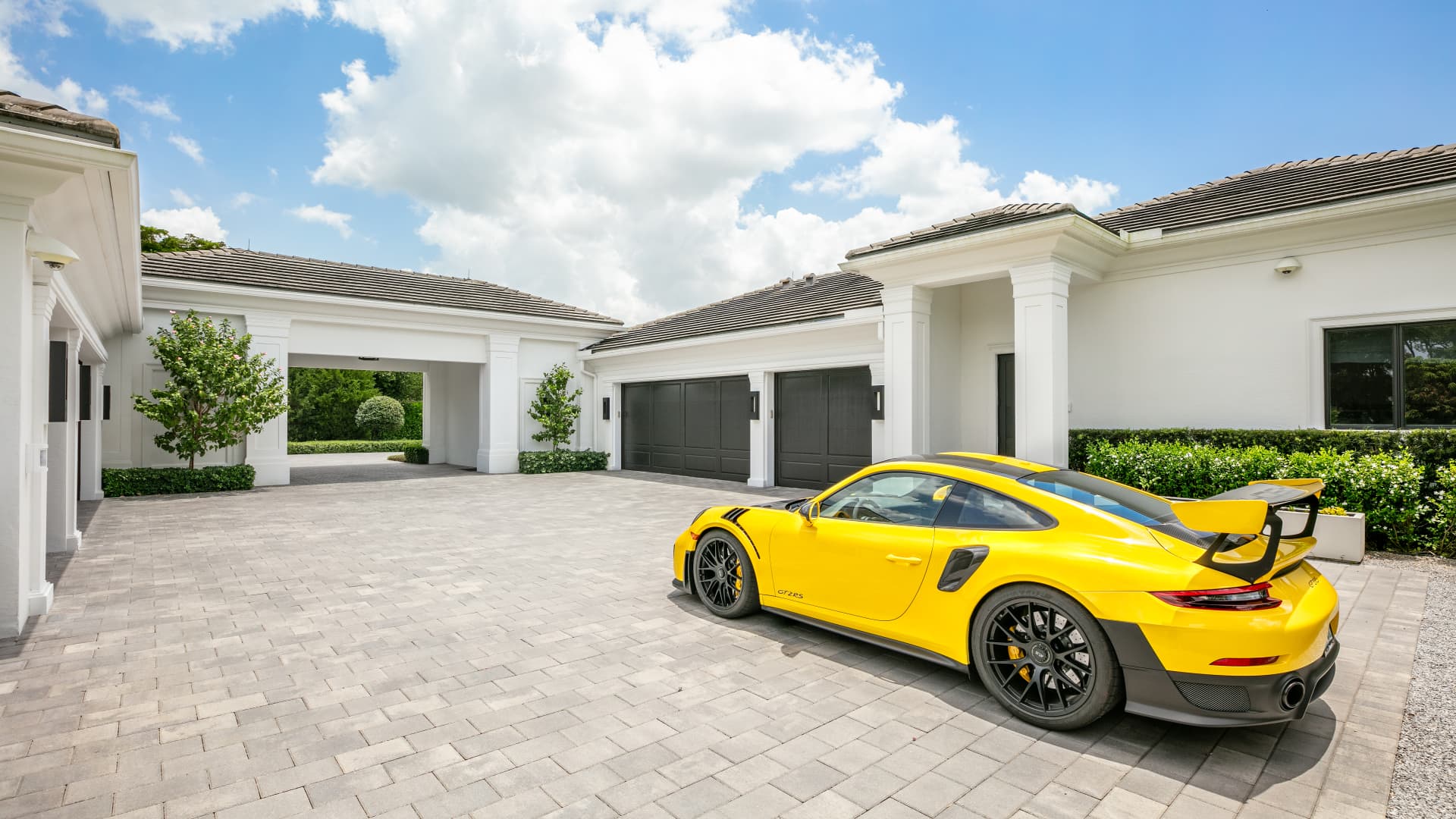 The home has air-conditioned parking for nine cars.