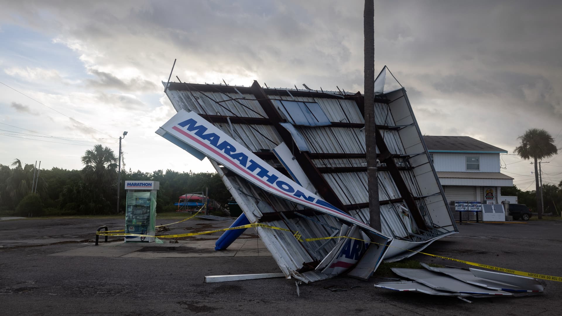 A damaged gas station is taped off after Hurricane Idalia made landfall in Cedar Key, Florida, on Aug. 30, 2023.