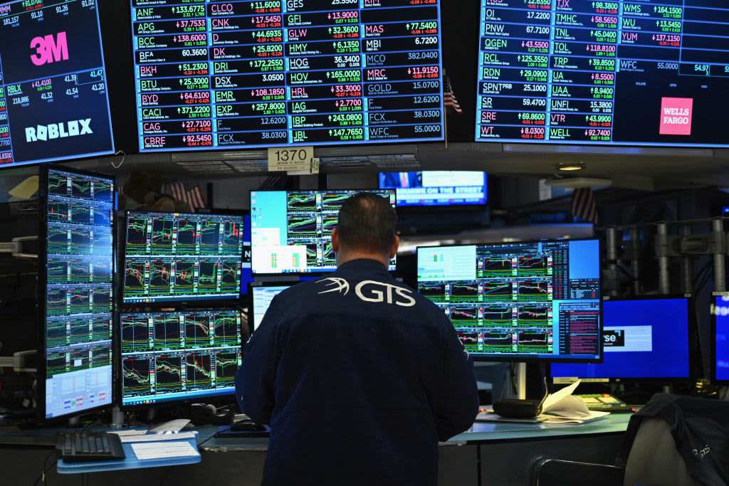 Stock futures slip after Nasdaq Composite retreats from record: Live updates
