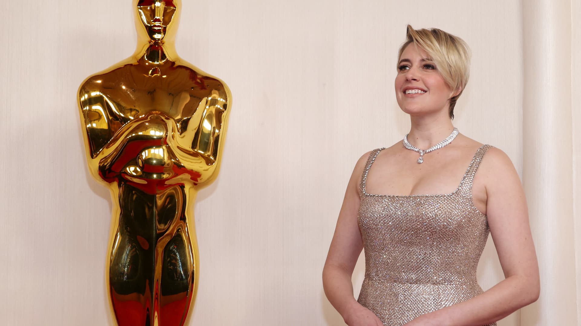Greta Gerwig poses on the red carpet during the Oscars arrivals at the 96th Academy Awards in Hollywood, Los Angeles, California, U.S., March 10, 2024.
