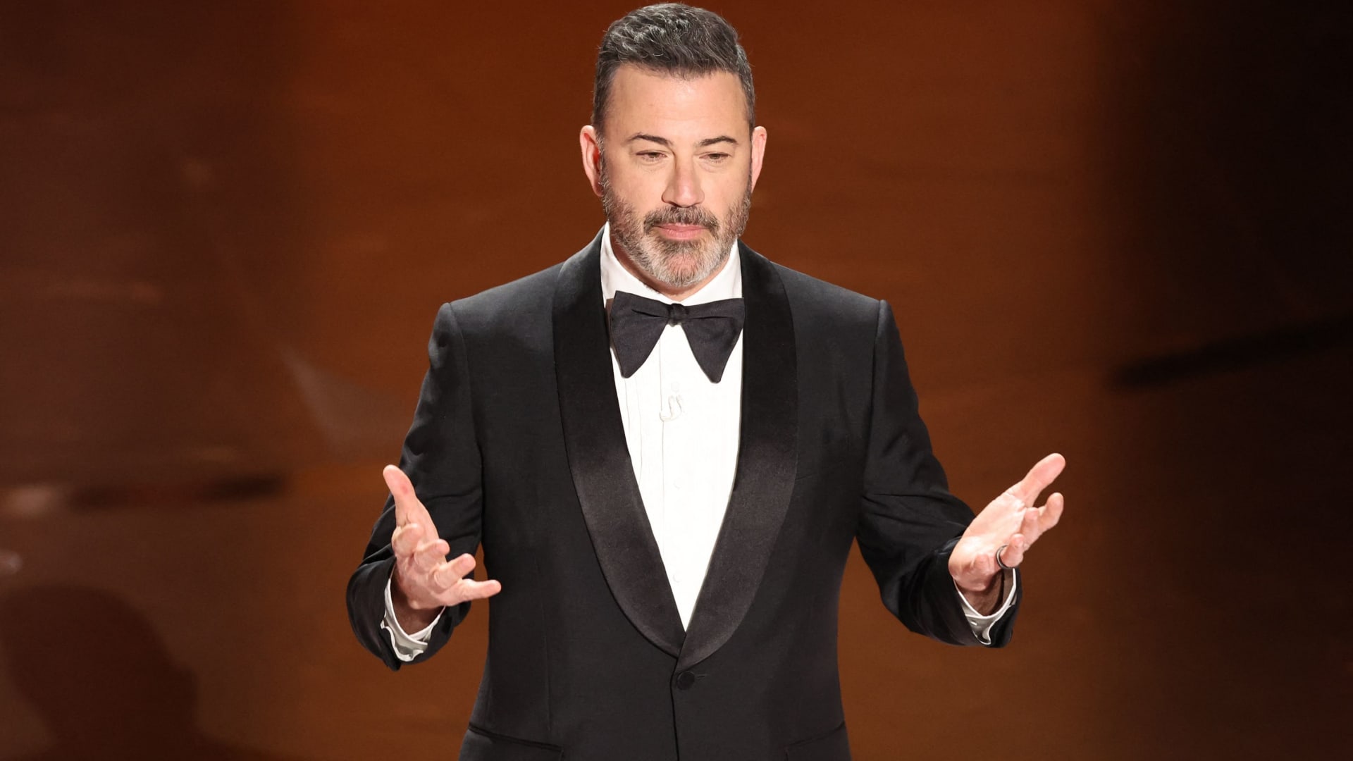 Show host Jimmy Kimmel delivers his opening monologue at the 96th Academy Awards in Hollywood, Los Angeles, California, U.S., March 10, 2024.