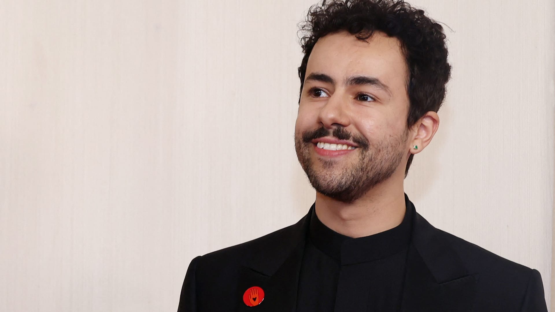 Ramy Youssef poses on the red carpet during the Oscars arrivals at the 96th Academy Awards in Hollywood, Los Angeles, California, U.S., March 10, 2024.