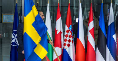 Swedish flag raised over NATO HQ for first time; Anger over Pope's 'white flag' call for Ukraine