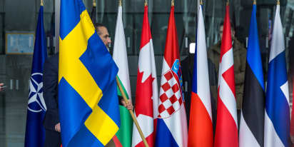 Swedish flag raised over NATO HQ for first time; Anger over Pope's 'white flag' call for Ukraine