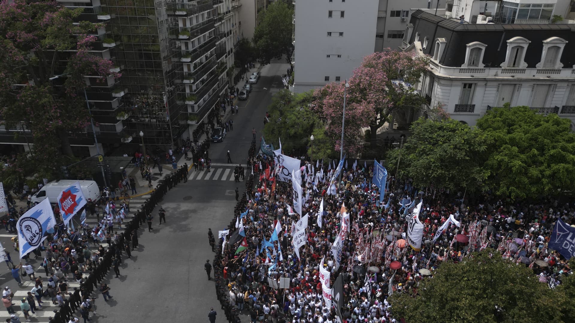 In this aerial view members of social organizations gather outside the Ministry of Human Capital to protest against food scarcity at soup kitchens and President Javier Milei's government's austerity plan in Buenos Aires on February 23, 2024.