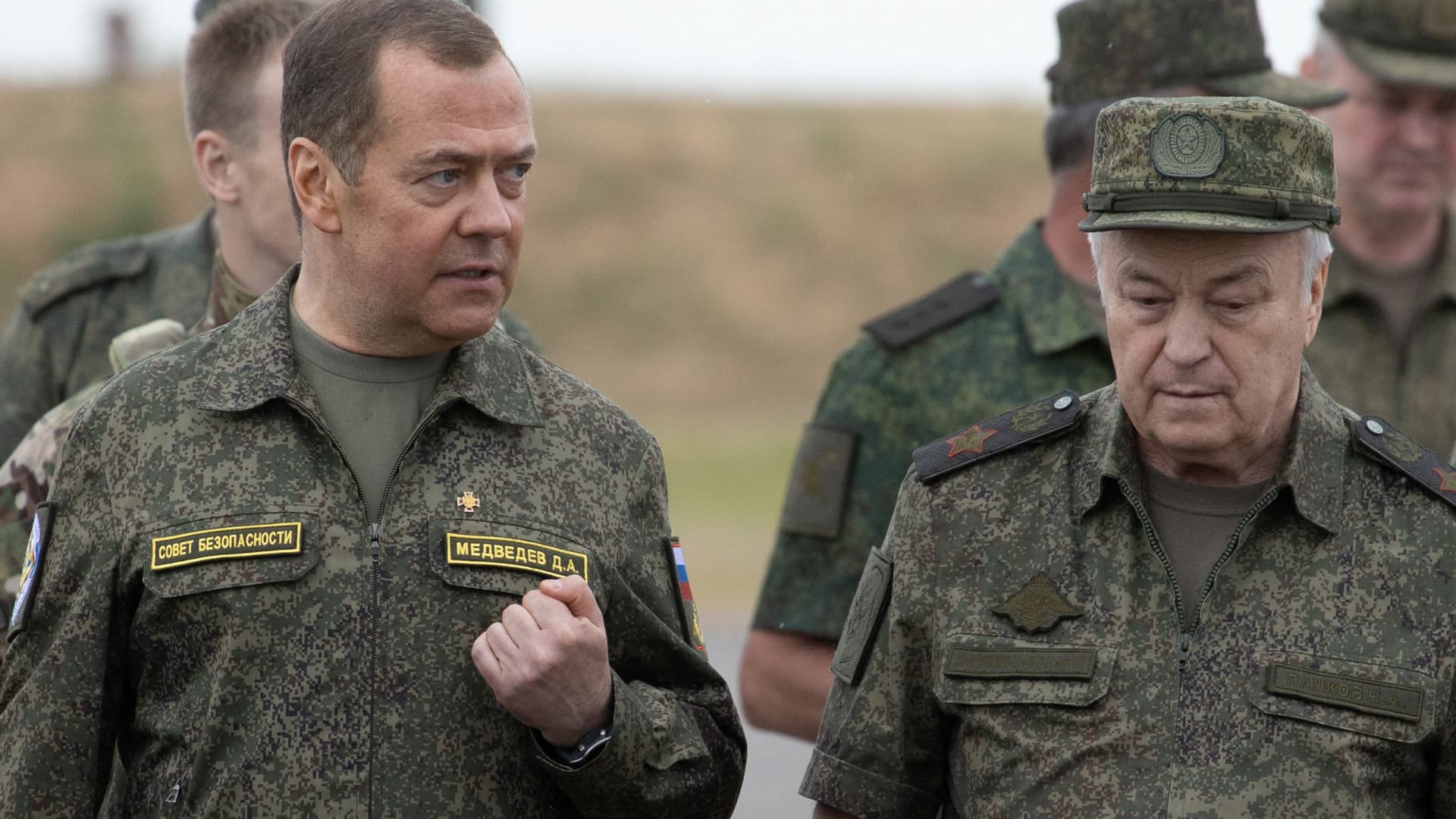 Russia's Deputy head of the Security Council Dmitry Medvedev, accompanied by Deputy Defence Minister Nikolay Pankov, visits the Prudboi military training ground in Volgograd region, Russia June 1, 2023. 
