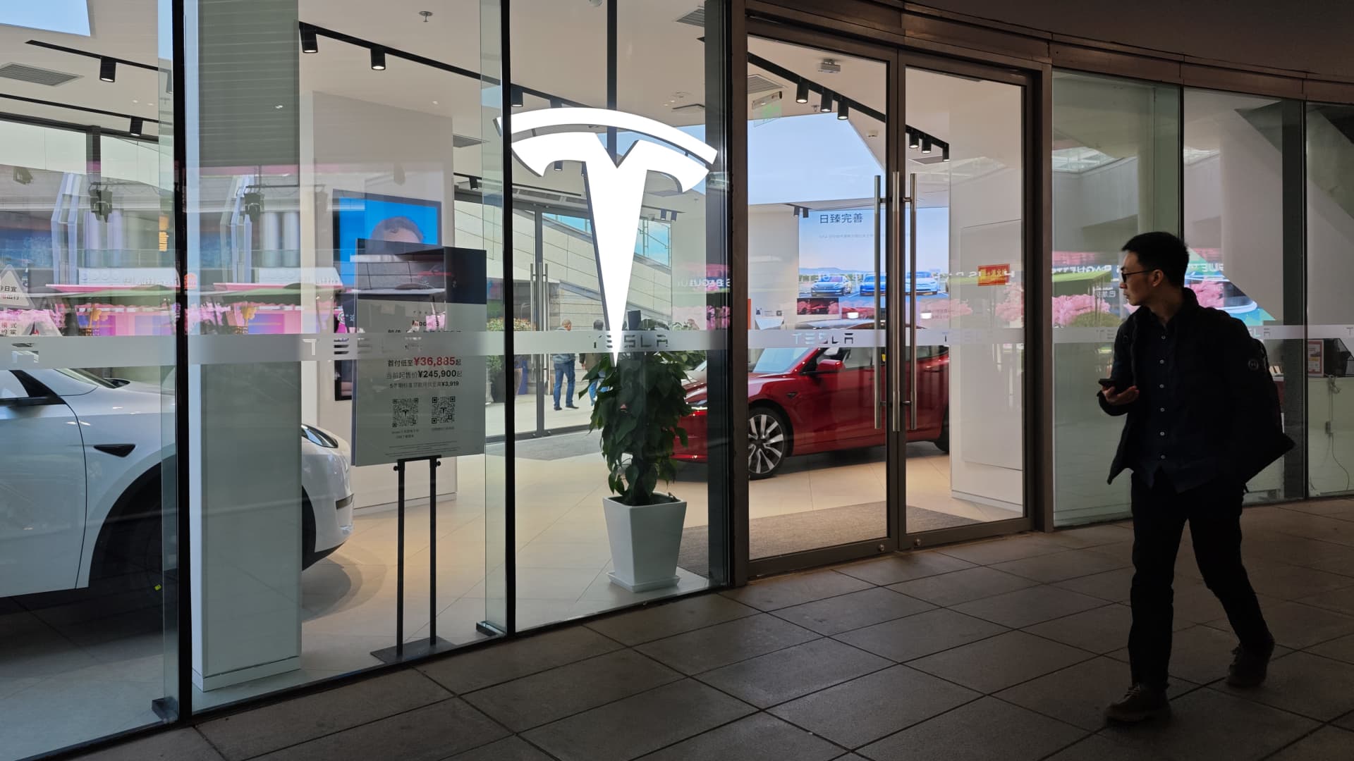 Tesla slides 3%, Li Auto sinks 8% as EV makers slash prices amid fierce competition