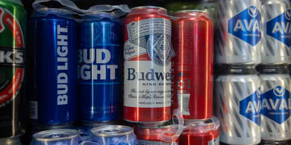 Budweiser owner AB InBev slides 4% after trading suspension as Altria sells stake