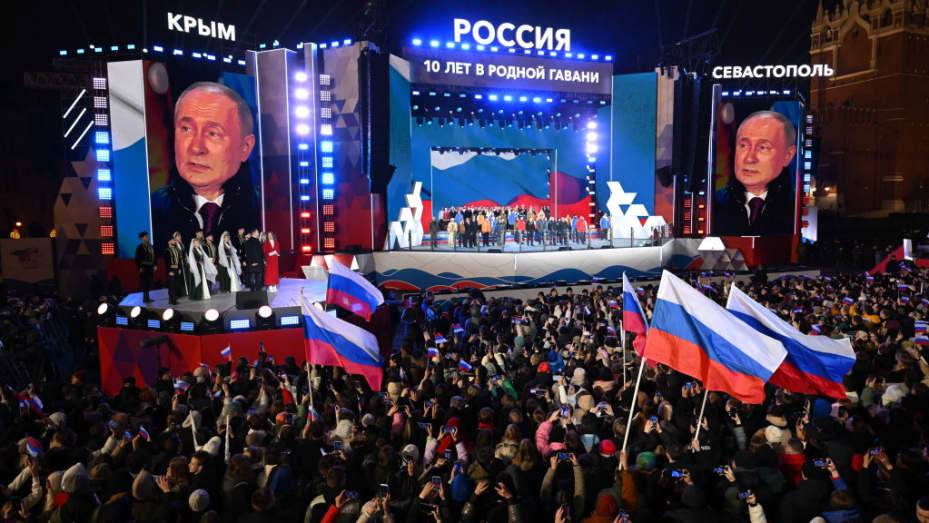 Russian President and presidential candidate Vladimir Putin addresses the crowd during a rally and a concert celebrating the 10th anniversary of Russia's annexation of Crimea at Red Square in Moscow on March 18, 2024. (Photo by NATALIA KOLESNIKOVA / AFP) (Photo by NATALIA KOLESNIKOVA/AFP via Getty Images)