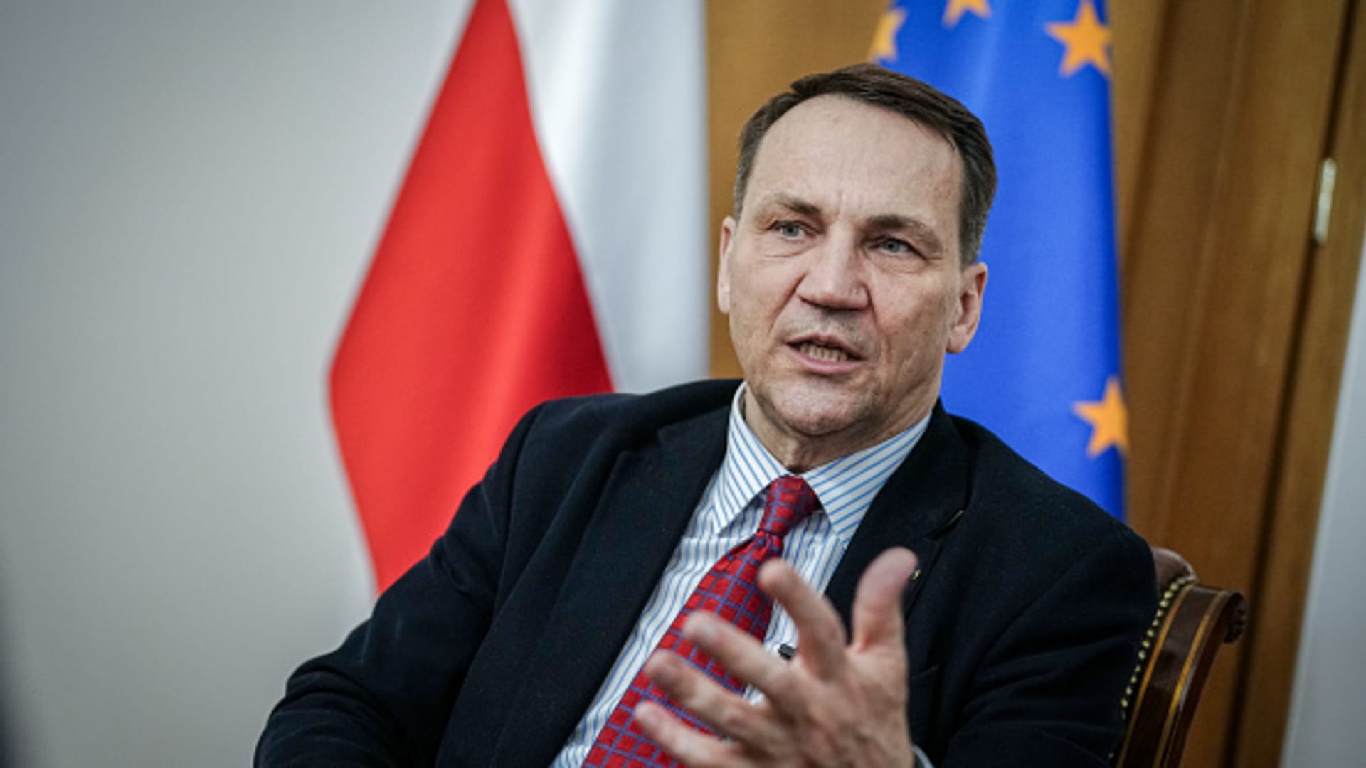 Radoslaw Sikorski, Foreign Minister of Poland, gestures during an interview with journalists from the German Press Agency. 