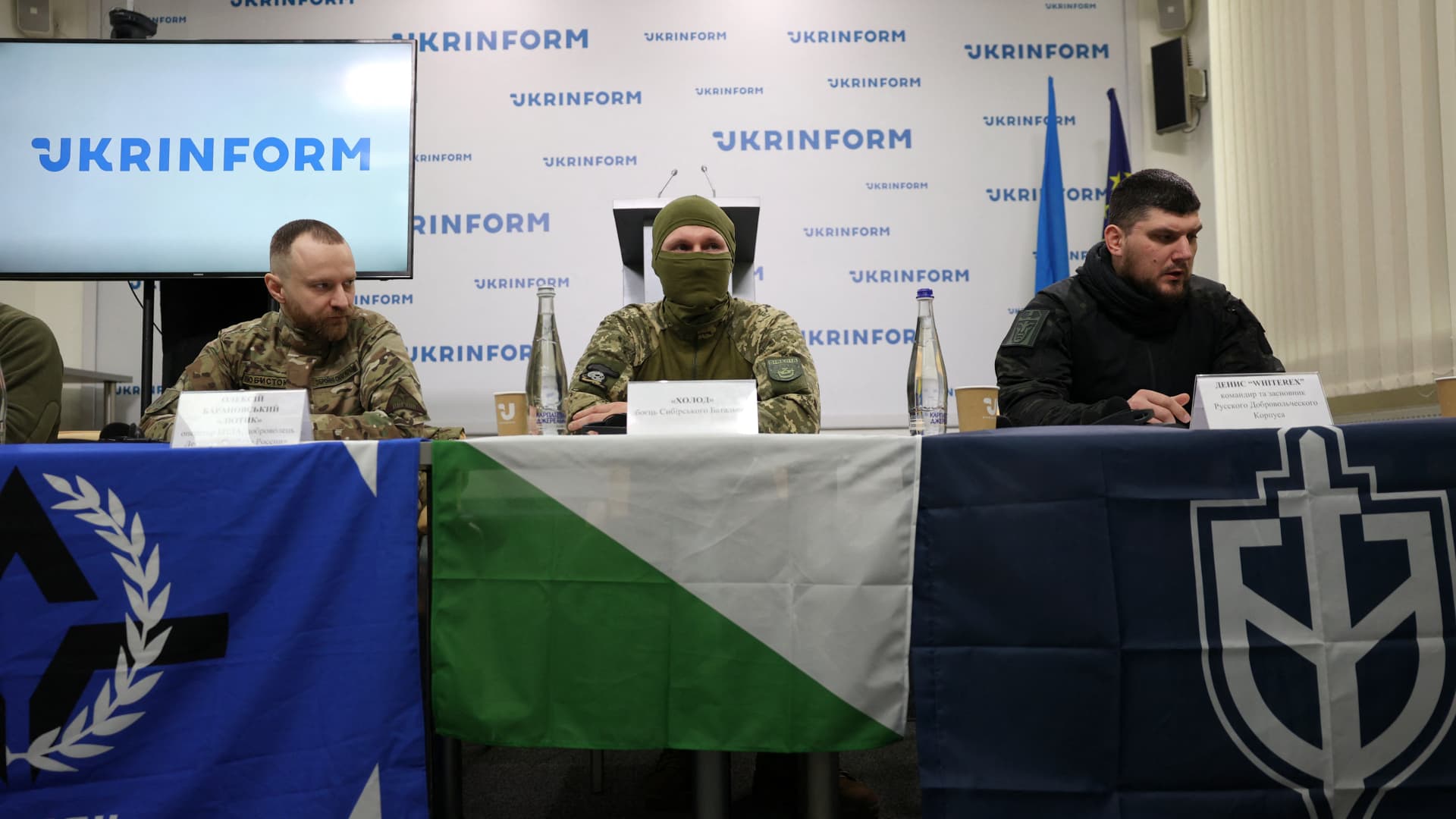 Oleksiy Baranovsky 'Lyutik', Unmanned Aerial Vehicle Operator (UAV) operator, and 'Freedom of Russia' legion volunteer (L), 'Holod' a fighter in the 'Siberian Battalion' (C), and the commander and founder of the Russian Volunteer Corps, Denis 'Whiterex' (R), take part in the press conference on behalf of the Russian Liberation Forces fighting on the Ukrainian side, in Kyiv on March 21, 2024, amid the Russian invasion of Ukraine.