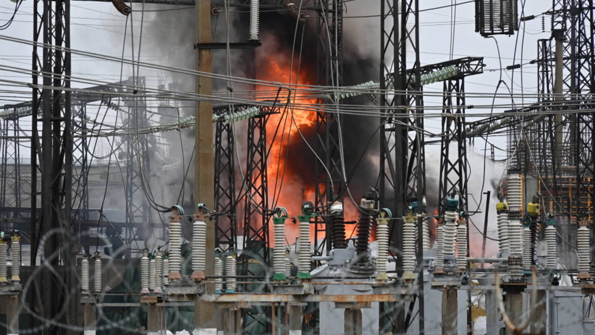 Firefighters extinguish a fire at an electrical substation after a missile attack in Kharkiv, on March 22, 2024, amid the Russian invasion in Ukraine. 
