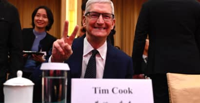 Why an all-smiles China visit from Apple's Tim Cook isn't good business