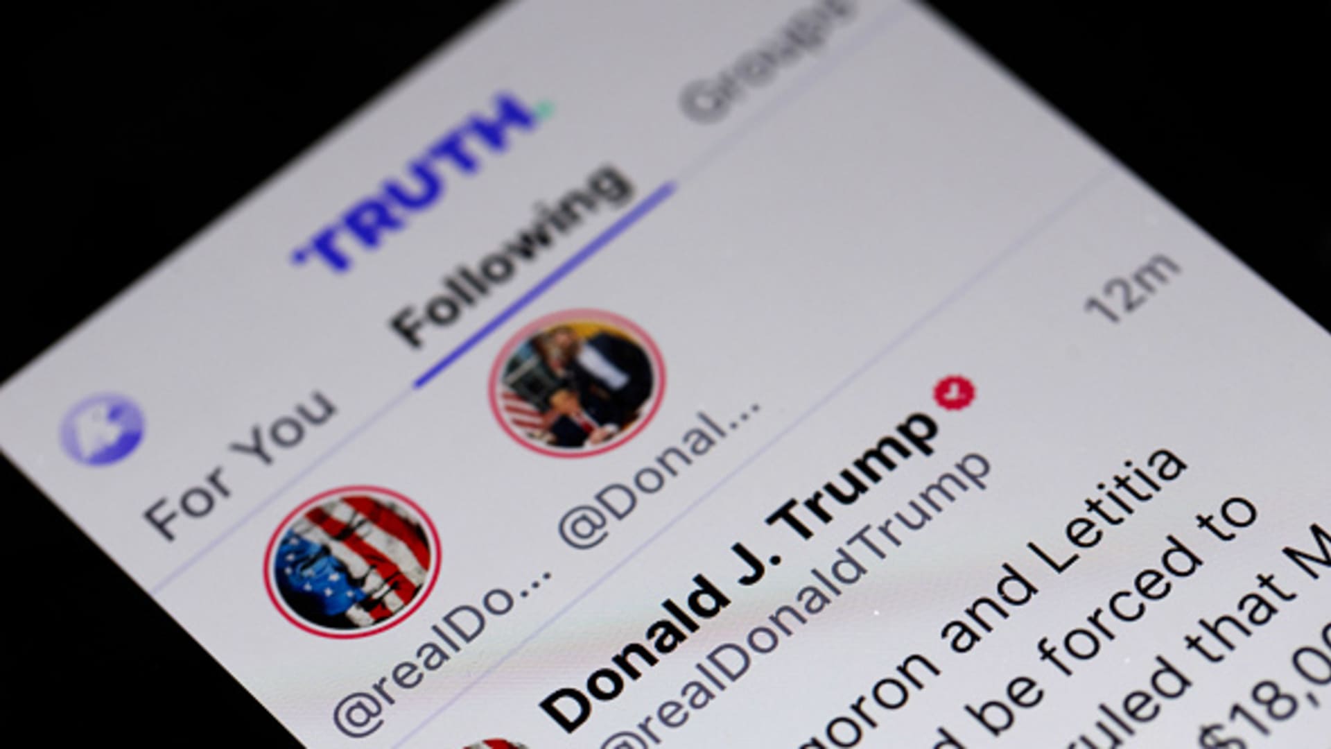 Former President Donald Trump's social media platform Truth Social is shown on a tablet in Chicago on March 25, 2024.