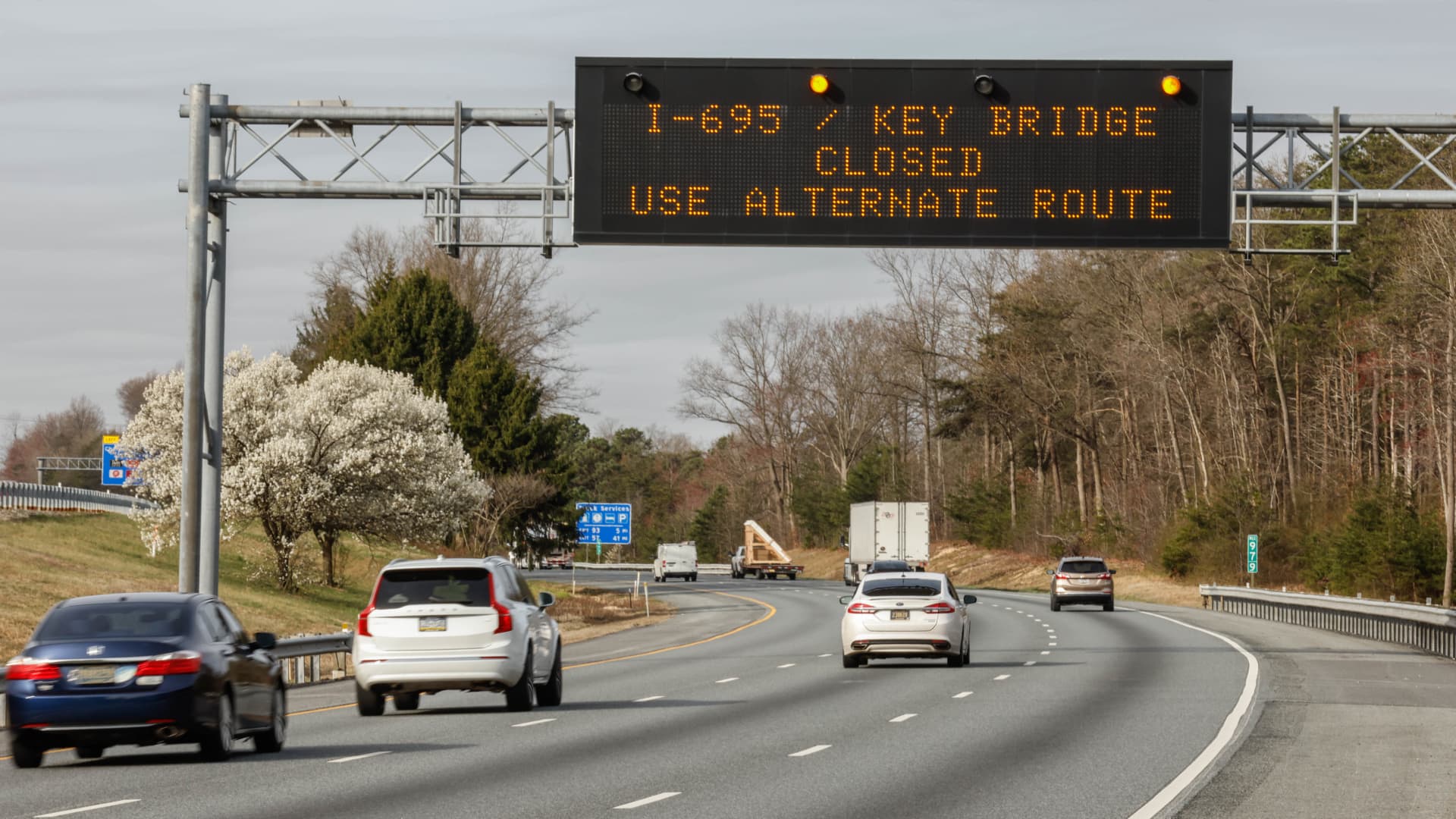 A traffic warning sign is displayed on Route 95 after a cargo ship collided with the Francis Scott Key Bridge causing it to collapse on March 26, 2024 in North East, Maryland. 