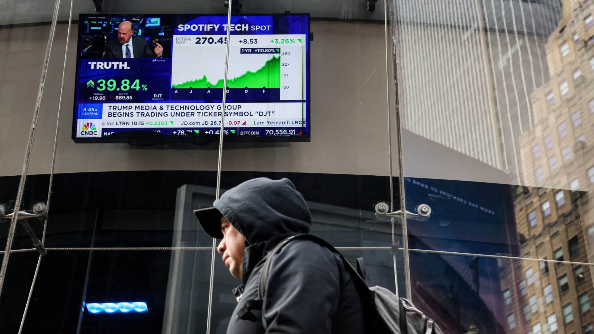 A screen displays trading information about shares of Truth Social and Trump Media & Technology Group outside the Nasdaq MarketSite in New York City on March 26, 2024.