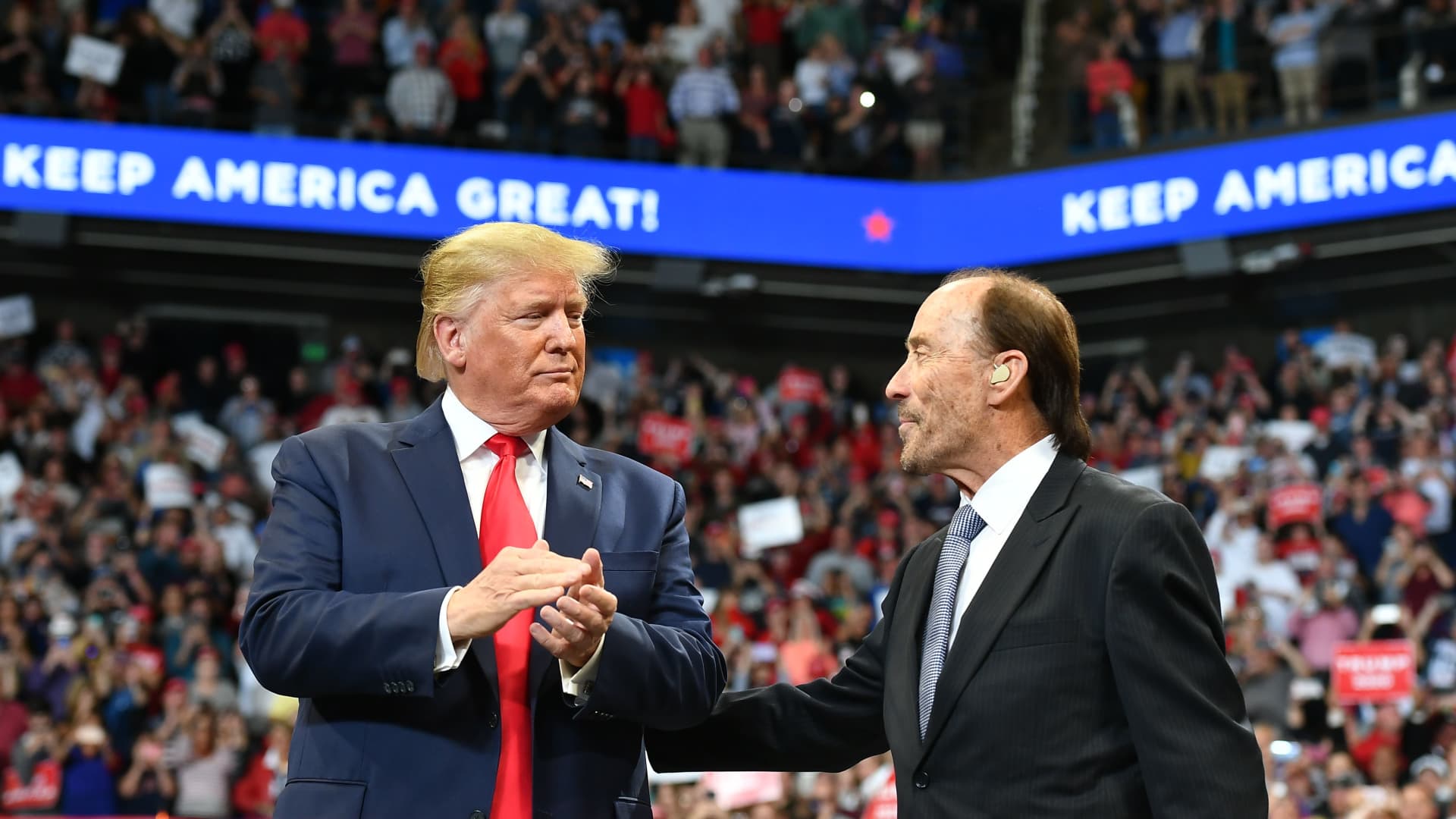 Former U.S. President Donald Trump, left, stands with singer Lee Greenwood during a rally at Rupp Arena in Lexington, Kentucky, on Nov. 4, 2019.