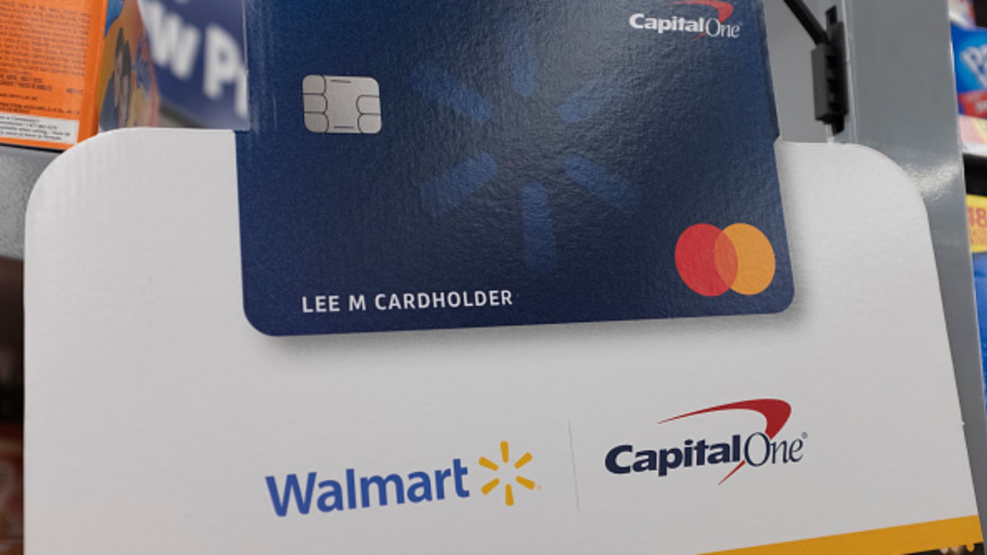 A Capital One Walmart credit card sign is seen at a store in Mountain View, California, United States on Tuesday, November 19, 2019.