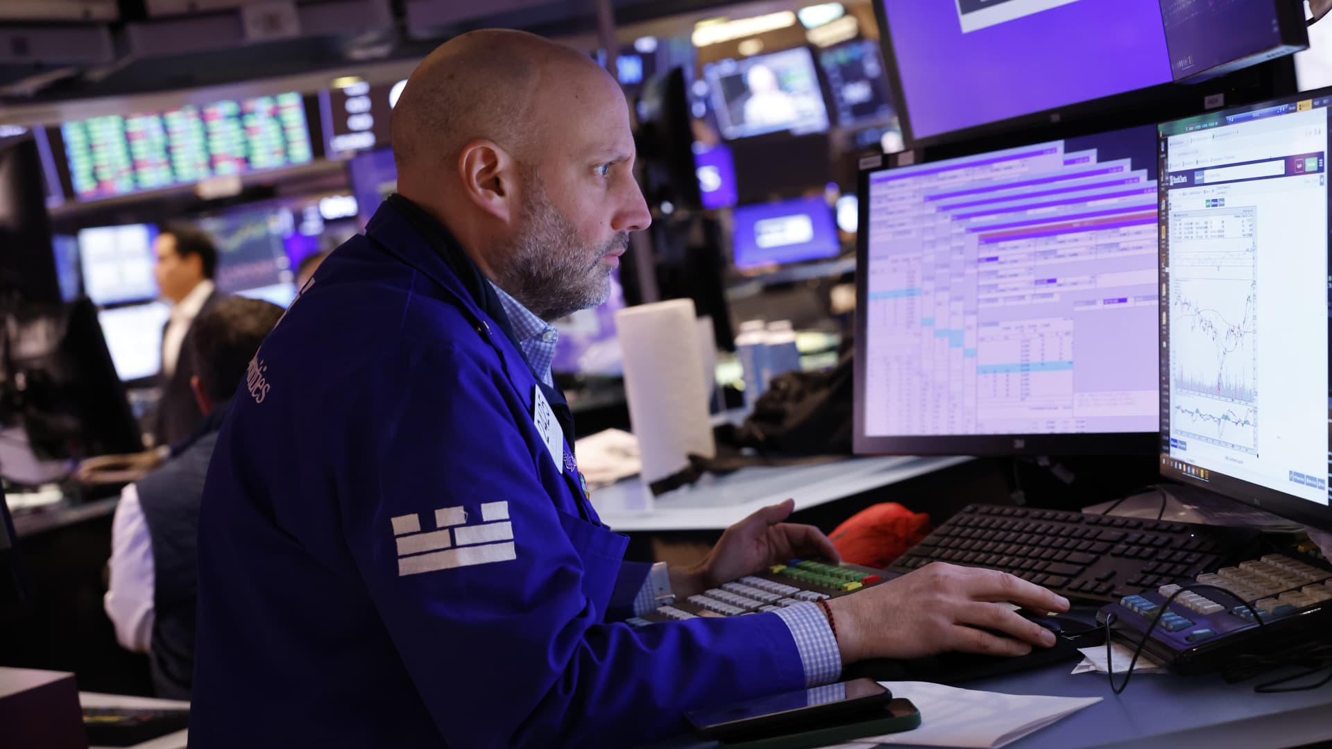 Traders work on the floor of the New York Stock Exchange during afternoon trading on March 27, 2024 in New York City. 