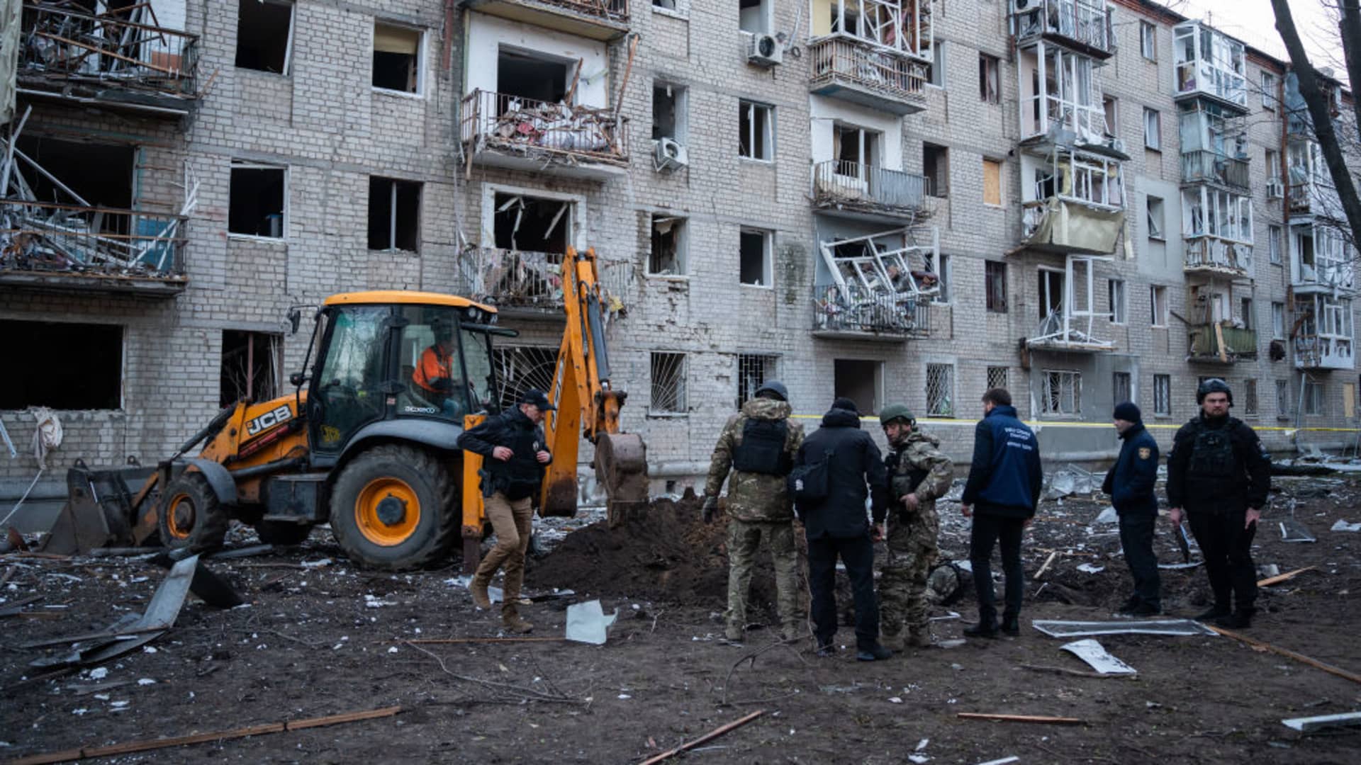 Military experts operate at the site of a Russian aerial bombing of a high-rise residential building in the Shevchenkivskyi district on March 27, 2024 in Kharkiv, Ukraine. 