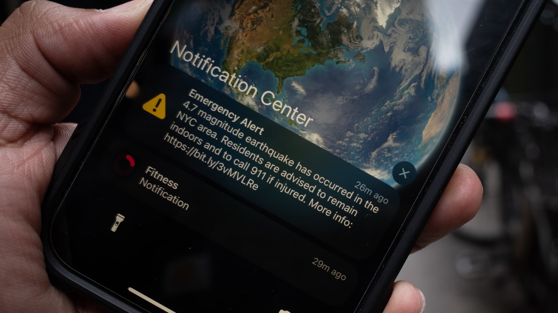 In this photo illustration, an emergency alert is displayed from the national Emergency Broadcast System warning of an earthquake in the area on April 5, 2024 in New York City.