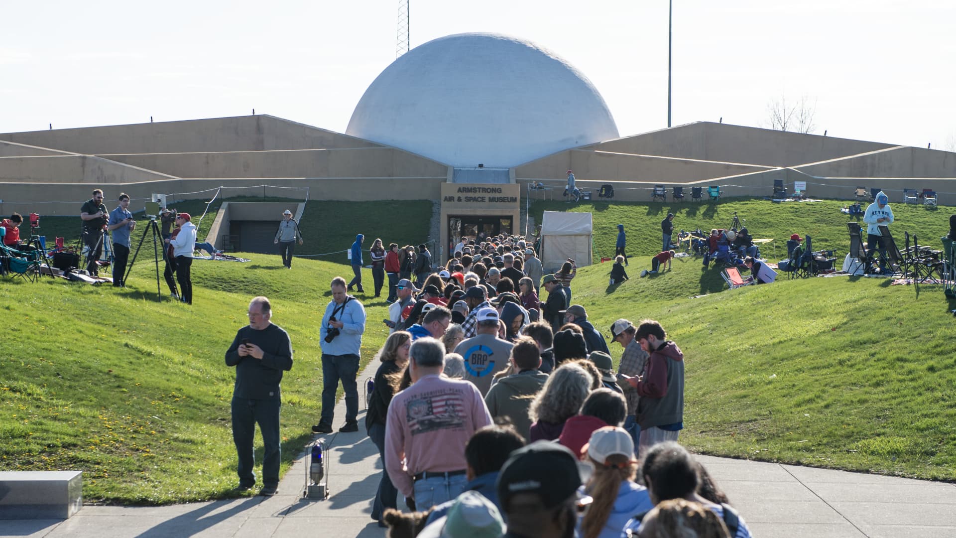 Thousands of people descend on the Neil Armstrong Air and Space Museum to view the total solar eclipse on April 8, 2024 in Wapakoneta, Ohio. 