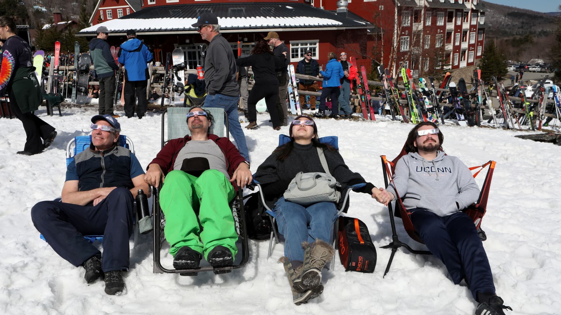 People assemble to view the total solar eclipse at Sugarbush ski resort in Warren, Vermont, U.S. April 8, 2024. 