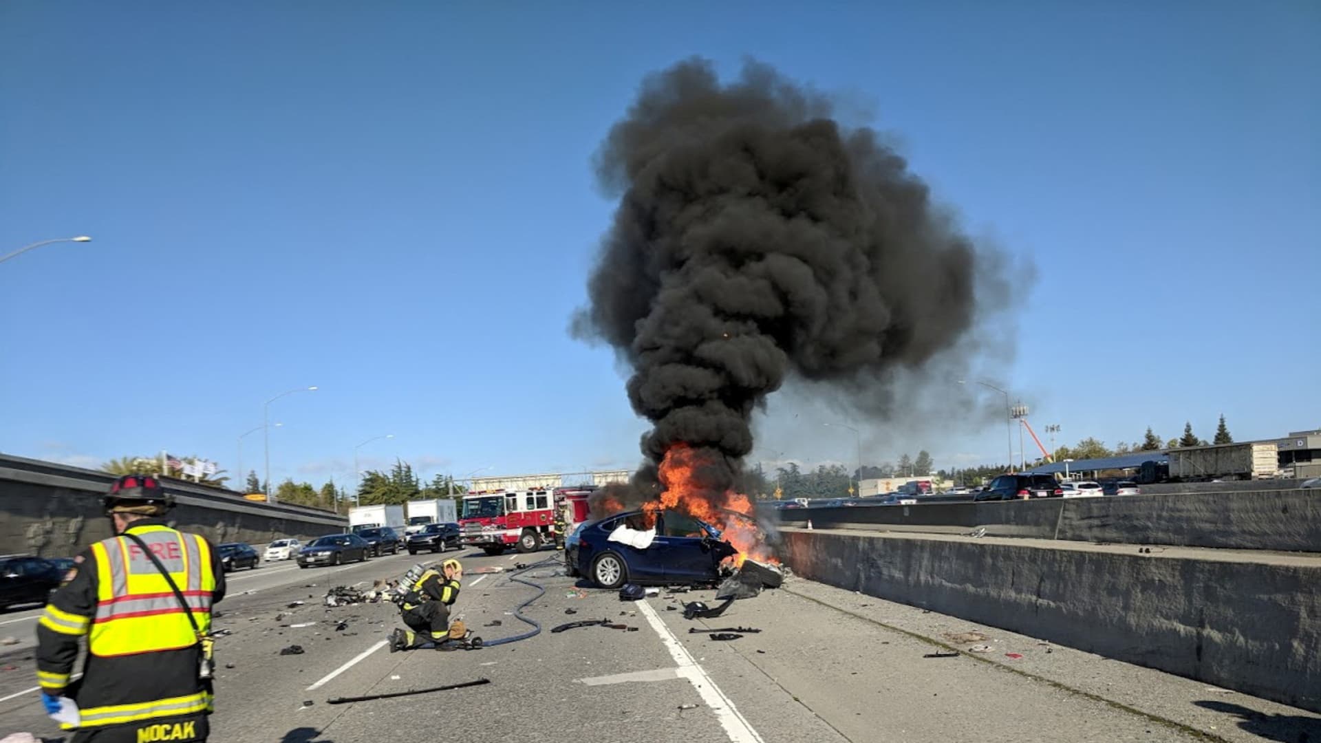 A Tesla Model X burns after crashing on U.S. Highway 101 in Mountain View, California, U.S. on March 23, 2018. 