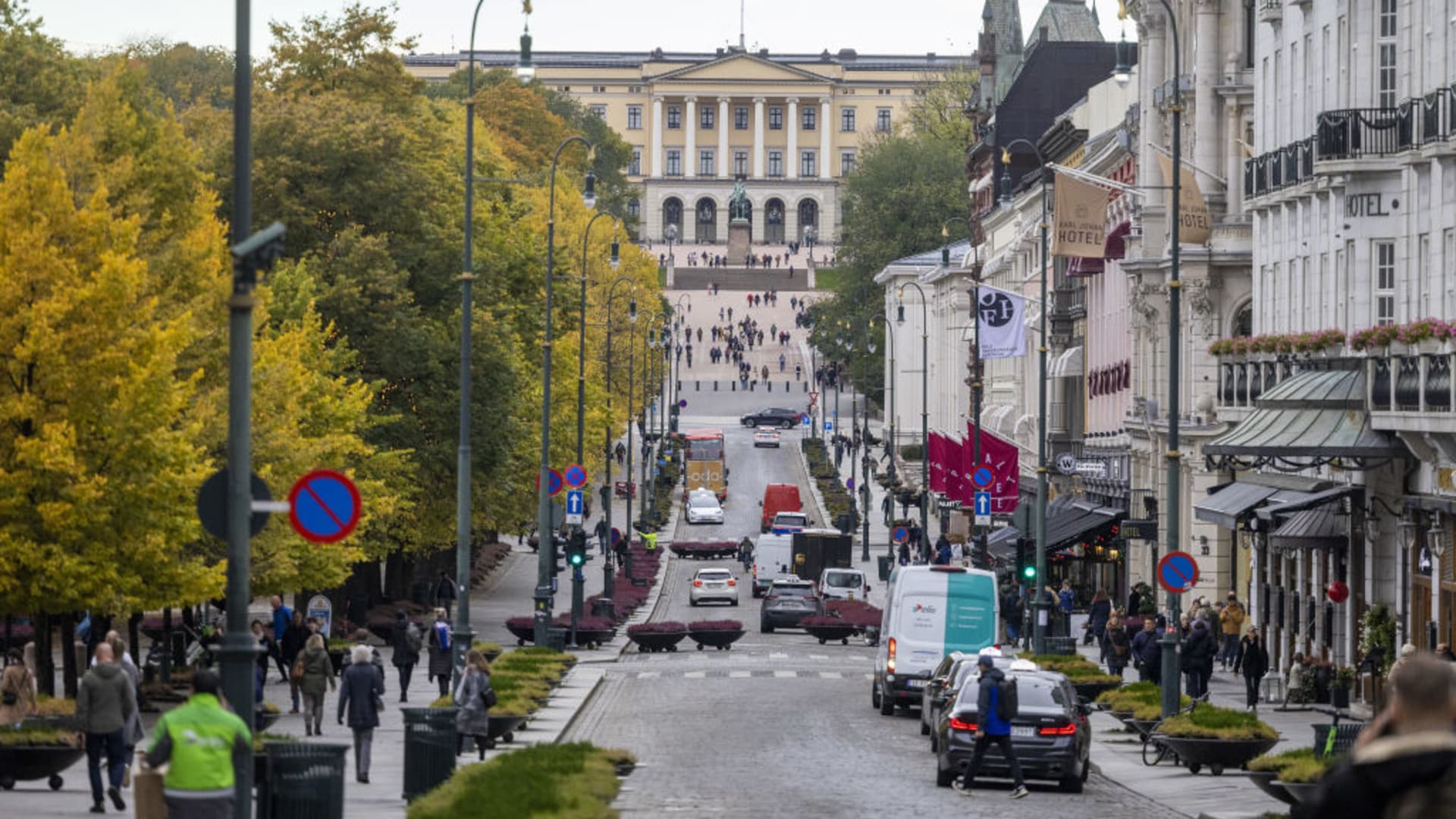 The Royal Palace beyond stores and restaurants along Karl Johans Gate in Oslo, Norway, on Tuesday, Oct. 17, 2023. 