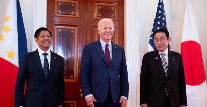 Biden warns on Beijing's South China Sea moves in Philippines-Japan summit