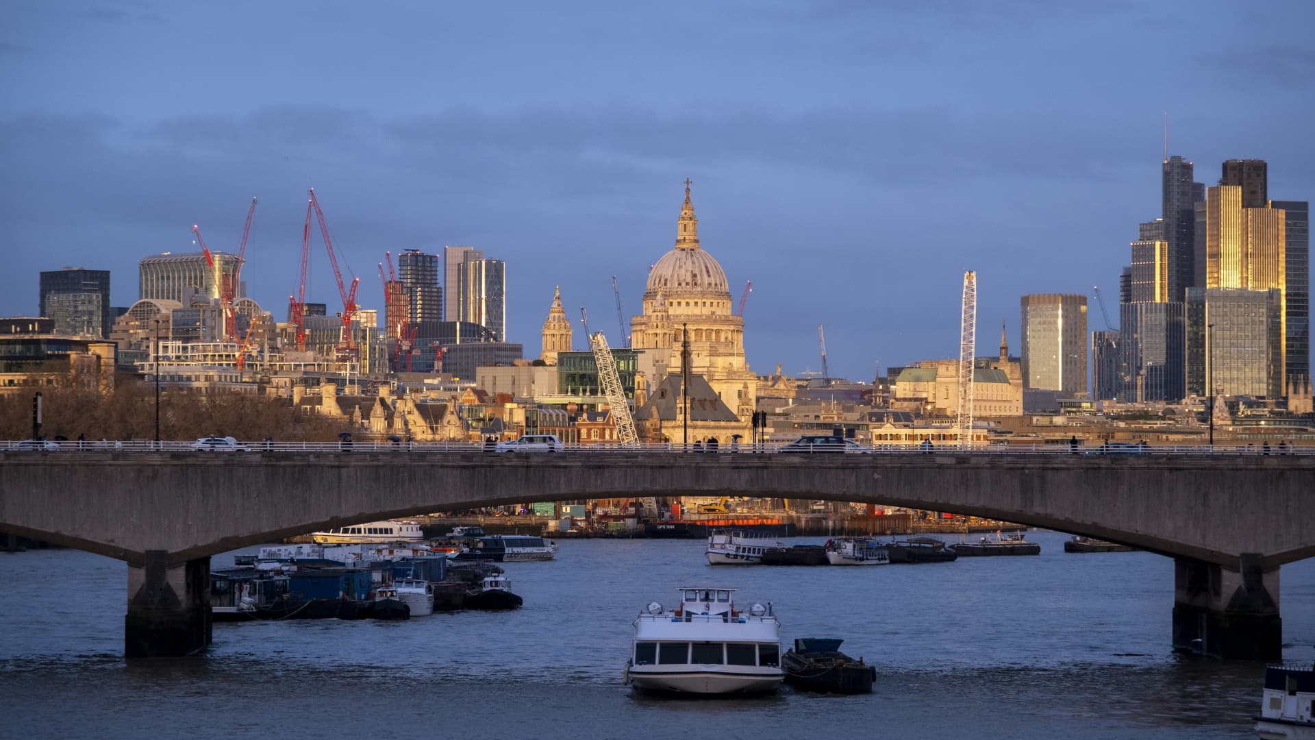 City of London skyline view looking over the River Thames and Waterloo Bridge at sunset on 10th February 2024 in London, United Kingdom.