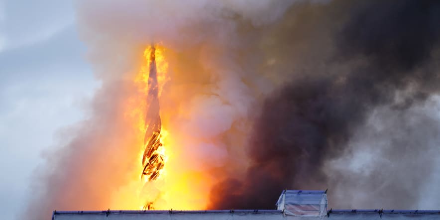 Fire engulfs Denmark’s historic stock exchange building, iconic spire collapses