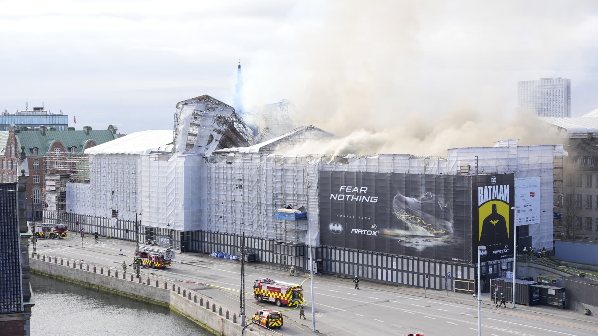 Plumes of smoke billow from the historic Boersen stock exchange building which is on fire in central Copenhagen, Denmark on April 16, 2024. The building, one of the oldest in the Danish capital, was undergoing renovation work when in the morning it caught fire, whose cause was yet unknown.