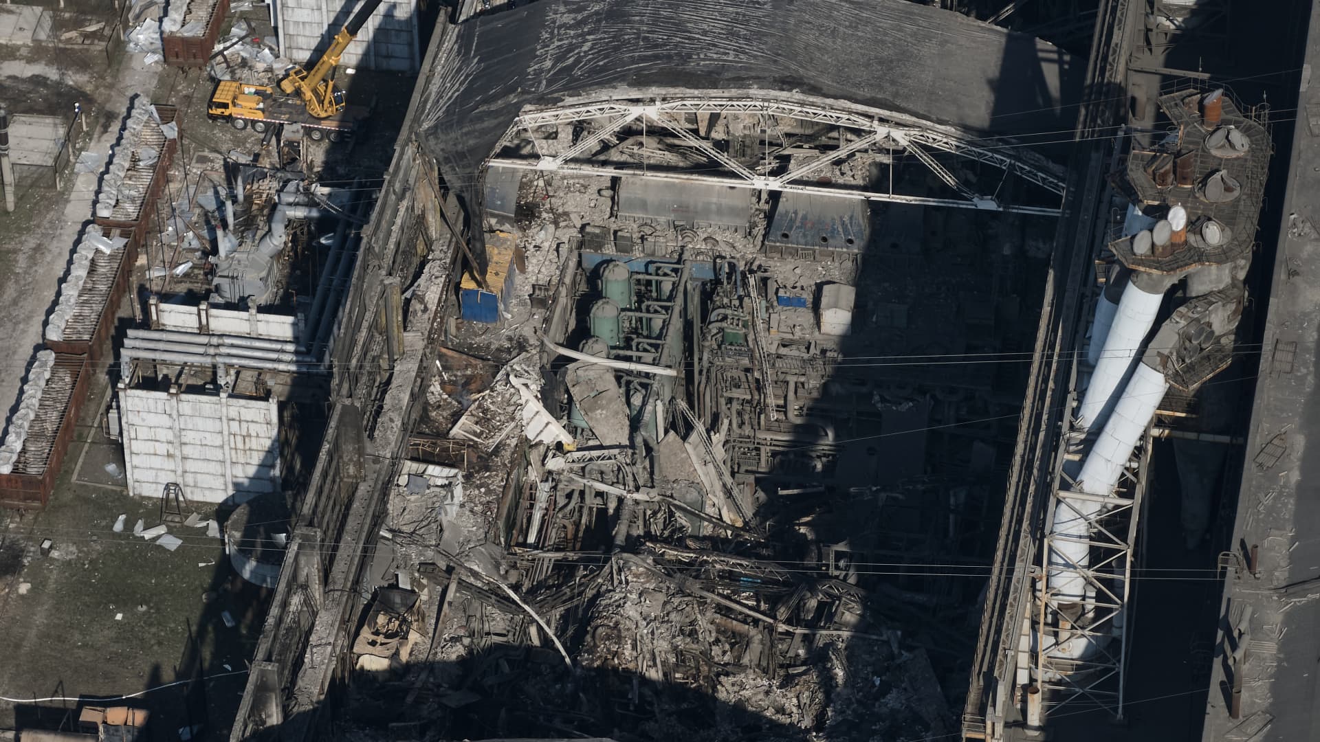 :An aerial view of the destroyed engine room of Trypilska Thermal Power Plant (TPP) after rocket fire on April 11, 2024 in Ukrainka, Kiev district, Ukraine. After a Russian missile attack on Thursday night, Trypilska Thermal Power Plant (TPP), Ukraine's largest power-generating plant in the Kyiv region, was reported completely destroyed. It supplied electricity to the regions of Kyiv, Cherkasy, and Zhytomyr. No power cuts occurred in Kyiv or other supplied regions. Trypilska TPP was a 1800 MW thermal power station in Kyiv Oblast, Ukraine, built by the USSR in 1969 and completed in 1977. During the Russian invasion of Ukraine, the station was permanently disabled on April 11, 2024 after Russian missiles set fire to the main turbine hall. (Photo by Kostiantyn Liberov/Libkos/Getty Images)