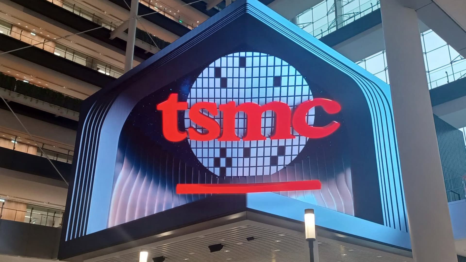 A logo of Taiwan Semiconductor Manufacturing Company (TSMC) is seen during the TSMC global RnD Center opening ceremony in Hsinchu on July 28, 2023. (Photo by Amber Wang / AFP)