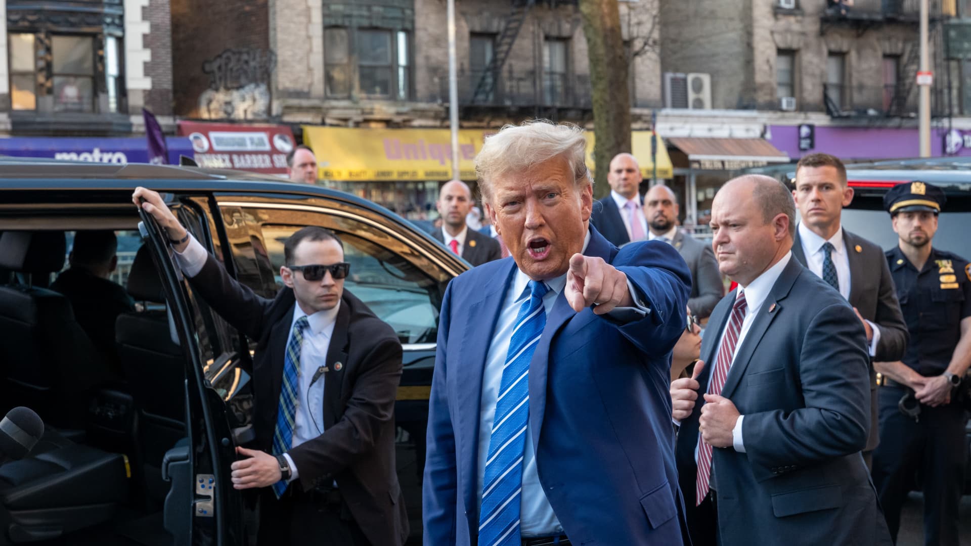 Former President Donald Trump visits a bodega in the Harlem neighborhood of upper Manhattan where a worker killed a man who had assaulted him in 2022, on April 16, 2024 in New York City. 